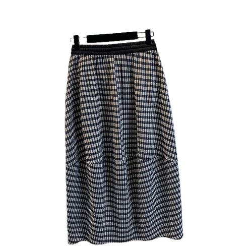 Jupe femme à carreaux rétro, loose et casual, avec taille élastique et lacets, idéale pour l'été.