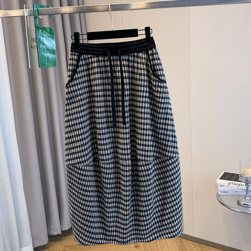 Jupe femme à carreaux rétro, loose et casual, avec taille élastique et lacets, idéale pour l'été.