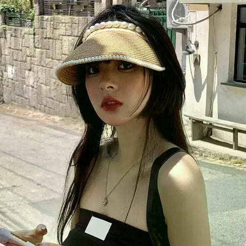 Chapeau de Soleil Raphia à large bord décoré de perles pour femmes, idéal pour l'été et la protection solaire.