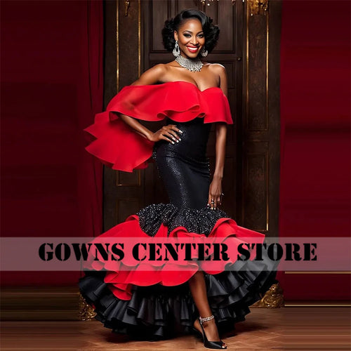 Robe sirène Aso Ebi noire & rouge – Perlée & Volants, mettant en avant des volants froncés et perles.