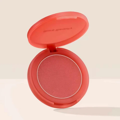 Luminizer & Blush Mat Longue Tenue - Waterproof in a set of four Rare Beauty products on a table.