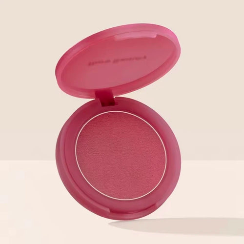 Luminizer & Blush Mat Longue Tenue - Waterproof in a set of four Rare Beauty products on a table.