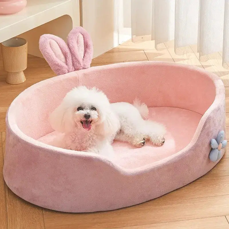 Lit détachable et lavable pour chien et cha - Un chien heureux se détend dans un lit doux et chaud.