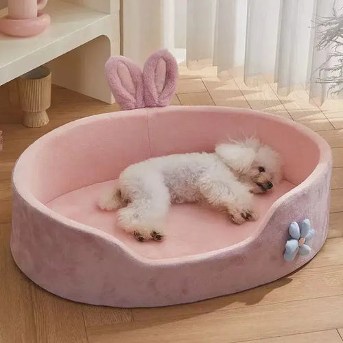 Lit détachable et lavable pour chien et cha - Un chien heureux se détend dans un lit doux et chaud.