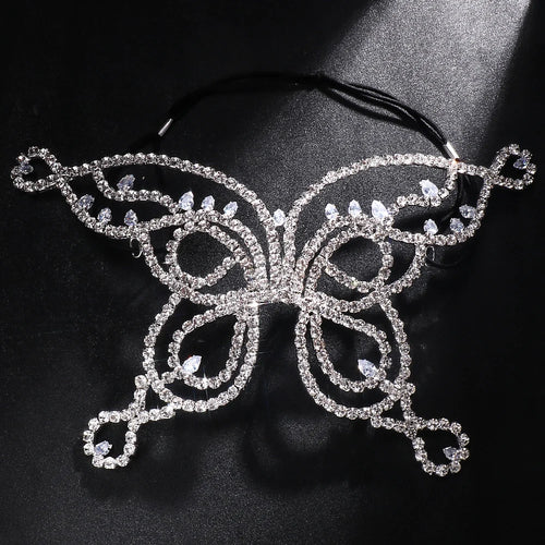 Voile masque papillon strass femme worn by model, showcasing its intricate design and elegance for masquerade events.