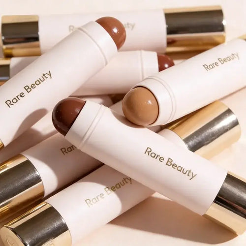 Stick Contour Waterproof Visage packaging displayed with makeup products and swatches on a neutral background.