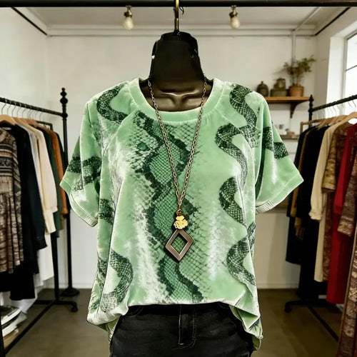 T-shirt femme imprimé animal avec un design de lapin en velours, coupe ample et élégante, parfaite pour un look décontracté.