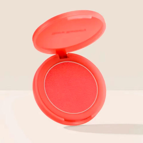 Luminizer & Blush Mat Longue Tenue - Waterproof in a set of four Rare Beauty products on a table.