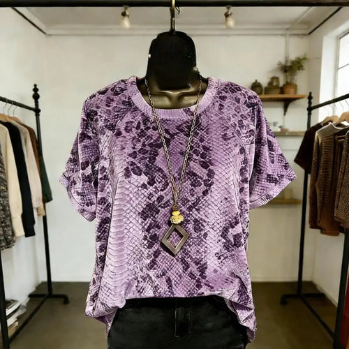 T-shirt femme imprimé animal avec un design de lapin en velours, coupe ample et élégante, parfaite pour un look décontracté.