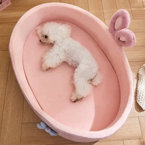 Lit détachable et lavable pour chien et cha - Un chien heureux se détend dans un lit doux et chaud.