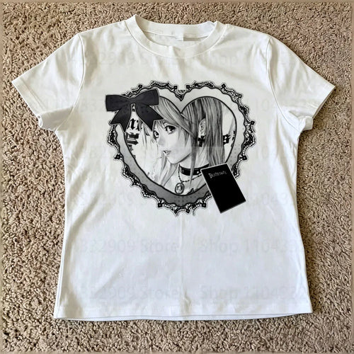 Baby Tee Crop Top Femme featuring an artistic design of a girl in a heart frame, perfect for vintage and alternative styles.