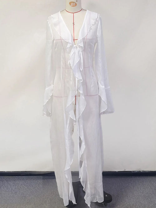 Robe longue rose et blanche à volants – Manches Longues, élégante robe estivale avec volants et manches longues.