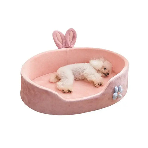 Lit détachable et lavable pour chien et cha - Un chien heureux se détend dans un lit doux et chaud.