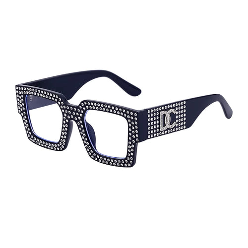 Lunettes de soleil carrées vintage femme avec design orné de strass et protection UV400.