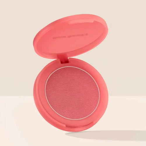 Luminizer & Blush Mat Longue Tenue - Waterproof in a set of four Rare Beauty products on a table.