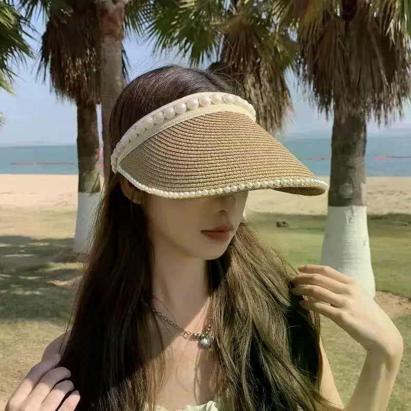 Chapeau de Soleil Raphia à large bord décoré de perles pour femmes, idéal pour l'été et la protection solaire.
