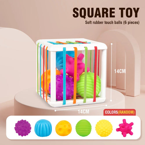 Jouet Montessori Sensoriel avec blocs colorés et sphères texturées pour éveil des bébés.