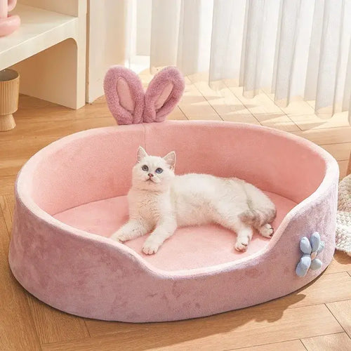Lit détachable et lavable pour chien et cha - Un chien heureux se détend dans un lit doux et chaud.